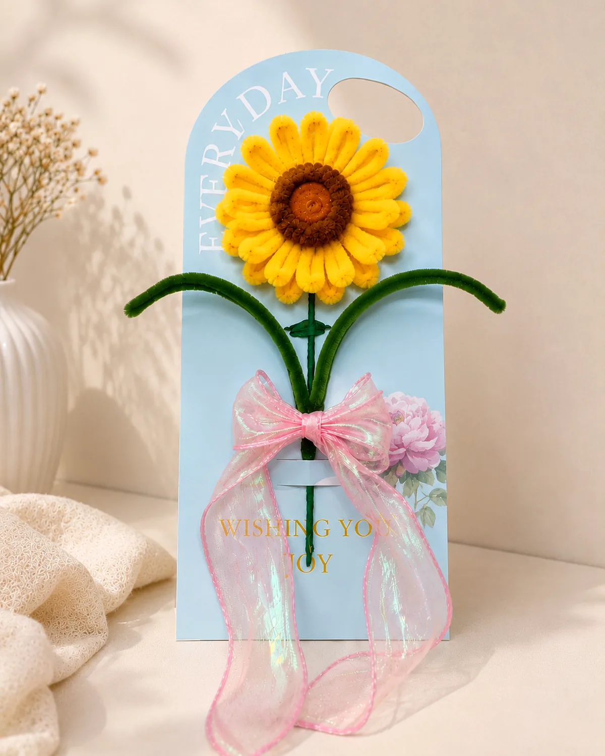 handmade pipe-cleaner flower mounted on a gift card, finished with a ribbon bow — sunflower, view 2